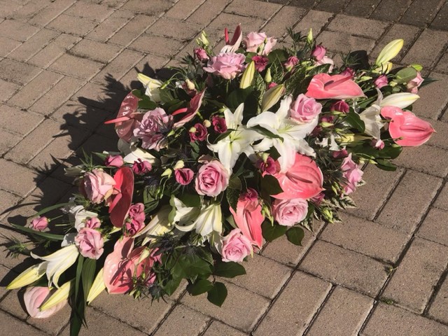 Pink lily and rose spray