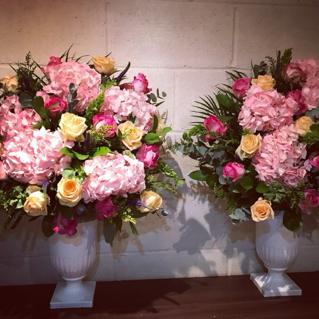 Pink floral urns