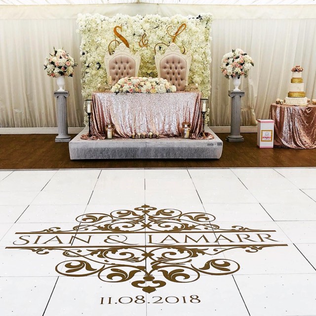 Sweetheart table with monogrammed dance floor